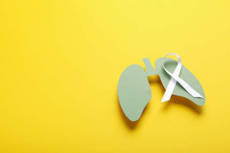 Lung Cancer Awareness Month concept on yellow backgroundの写真素材