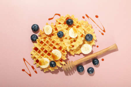 Concept of tasty food with wafers on pink backgroundの写真素材