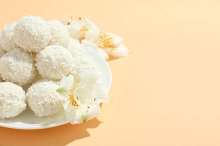 Concept of tasty sweets, coconut candies, space for text