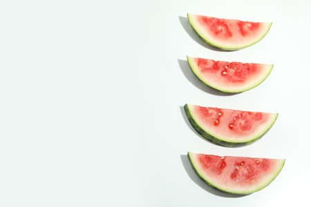 Fresh and juicy watermelon slices on white backgroundの写真素材