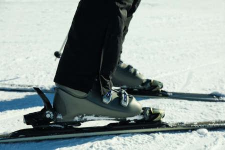 Skier legs on ski slope, ski seasonの写真素材