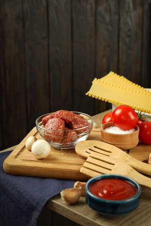 Concept of tasty cooking, cooking lasagna, space for text