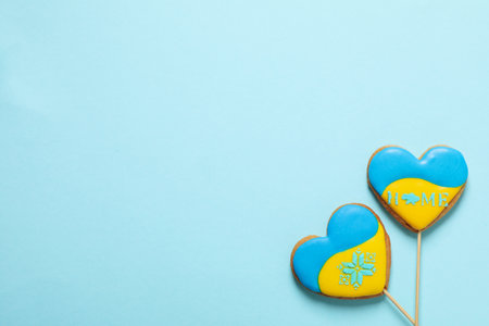 Cookies with Ukrainian flag colors on blue backgroundの写真素材