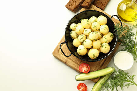 Concept of tasty food with boiled young potatoes, space for textの写真素材