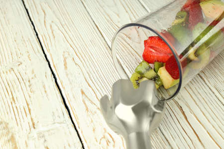 Concept of cooking tasty food with blender, space for text
