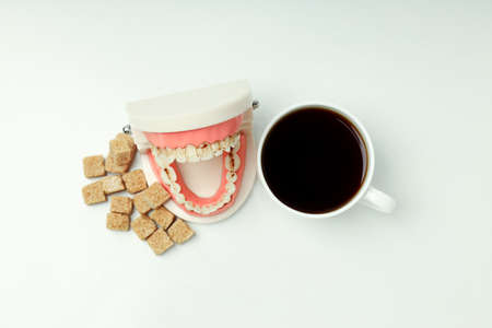Concept of food bad for teeth on light background