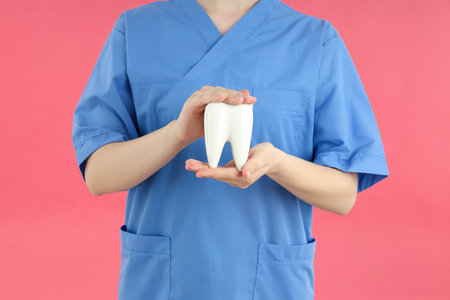 Concept of dental care on pink backgroundの写真素材