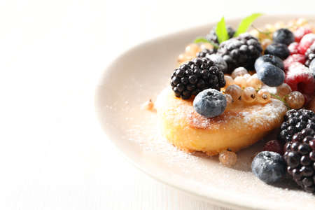 Concept of tasty sweet food, cheese pancakes, space for textの写真素材