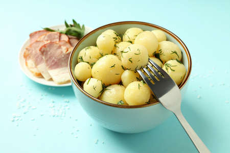 Concept of tasty food with boiled young potatoes, close upの写真素材