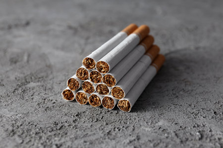 cigarettes on gray textured backgroundの写真素材