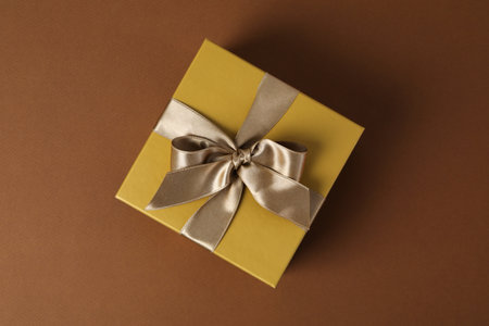 Concept of gift, gift box on brown backgroundの写真素材