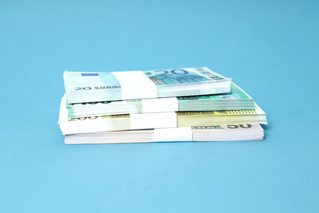 Concept of financials, money on blue backgroundの写真素材