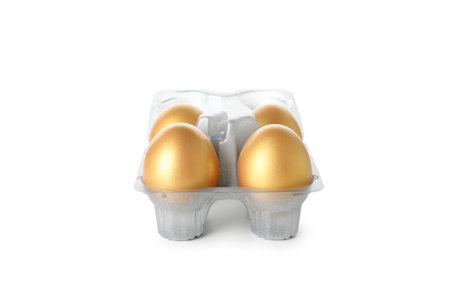 Concept of Richness, golden eggs, isolated on white backgroundの写真素材