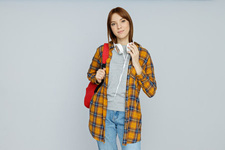 Concept of people, student girl on light gray backgroundの写真素材