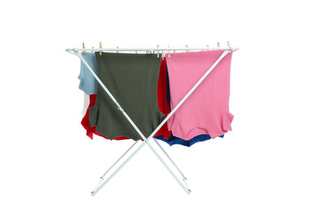 Drying rack with clothes, isolated on white backgroundの写真素材