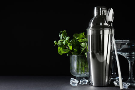 Concept of preparing cocktail, shaker, space for textの写真素材