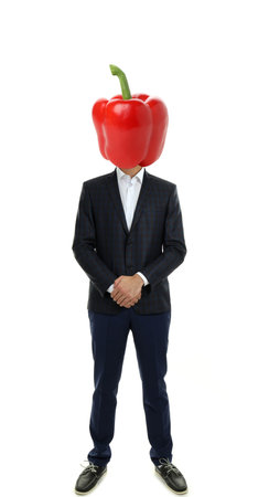 Businessman with pepper for a head, isolated on white backgroundの写真素材