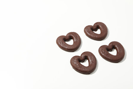 Concept of tasty bakery, gingerbread cookies in chocolate, space for textの写真素材