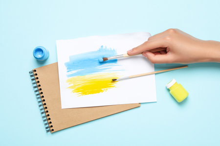 Concept of Help Ukraine, blue and yellow Ukrainian flag drawing