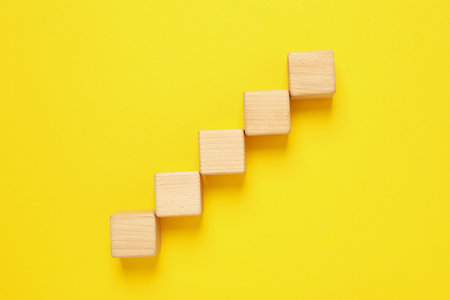 Blank wooden cubes for different concepts, top view