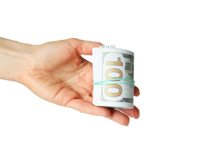 Concept of financials, female hand holds dollars, isolated on white background