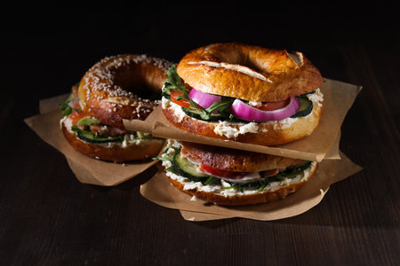 Concept of delicious food - tasty bagel sandwichの写真素材