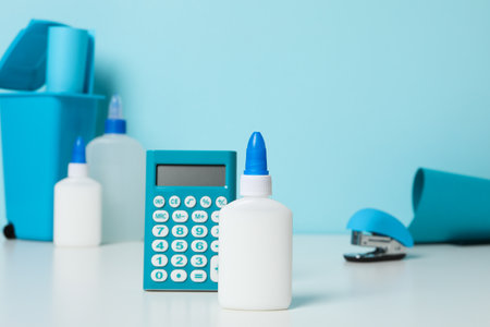 Concept of different office stationery with glue