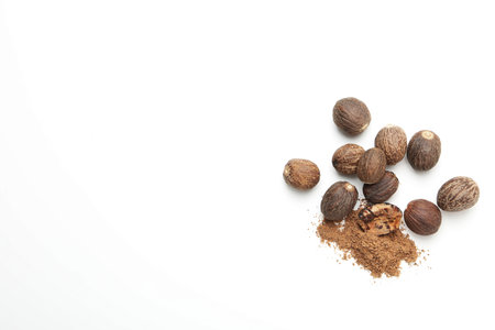 Concept of spices and condiments, nutmegs, space for text