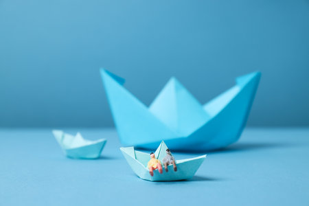 Concept of travel and adventure with paper boats