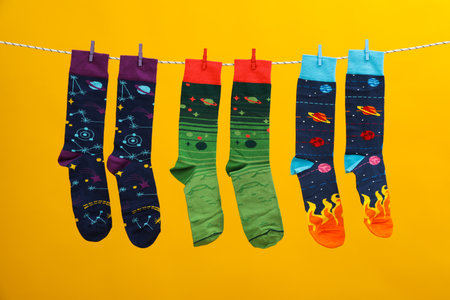 Concept of clothes for legs - different socksの写真素材