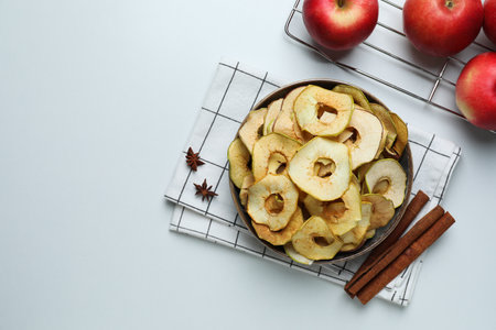 Concept of tasty food, dried apple chips, space for textの写真素材