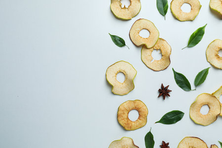 Concept of tasty food, dried apple chips, space for textの写真素材