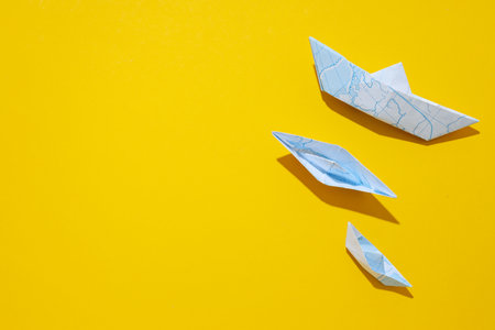 Concept of travel and adventure with paper boatsの写真素材