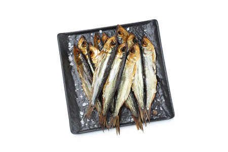 Concept of tasty food - smoked fish, isolated on white backgroundの写真素材