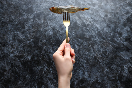 Concept of tasty food - delicious smoked fishの写真素材