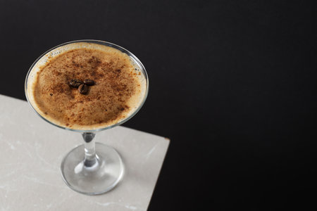 Espresso martini cocktail, delicious alcohol drink, space for text