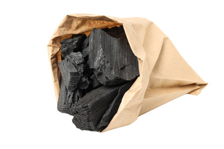 Natural wood charcoal isolated on white backgroundの写真素材