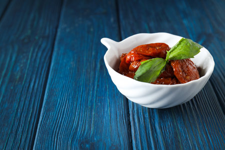 Concept of tasty food - sun-dried tomato, space for textの写真素材