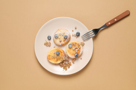 Concept of tasty sweet food, cheese pancakes, top view