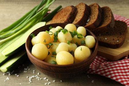 Concept of tasty food with boiled young potatoes, close upの写真素材