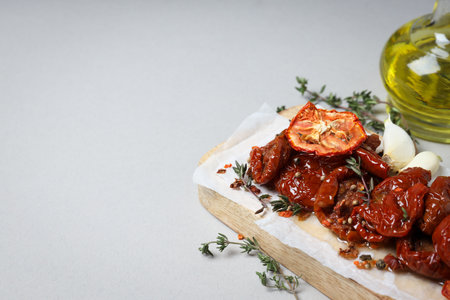 Concept of tasty food - sun-dried tomato, space for textの写真素材