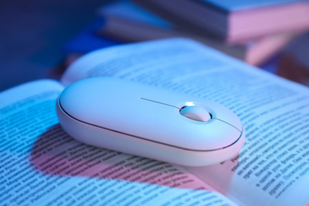 Concept of books vs technology, old search for information vs modern search for informationの写真素材