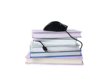 Concept of books vs technology, isolated on white backgroundの写真素材