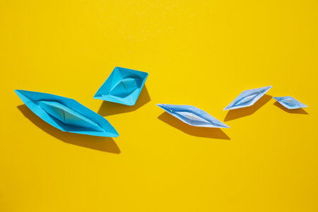 Concept of travel and adventure with paper boatsの写真素材