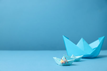 Concept of travel and adventure with paper boatsの写真素材