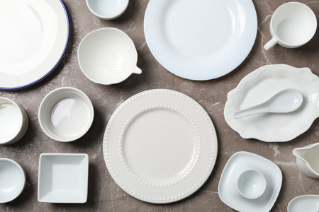 Minimal table setting with blank dish, top viewの写真素材