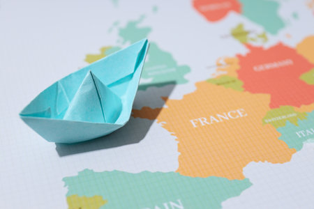Concept of travel and adventure with paper boatの写真素材
