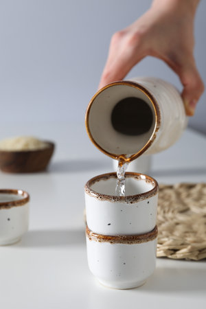 Traditional Japanese alcoholic drink - Sake, traditional asian drinks conceptの写真素材