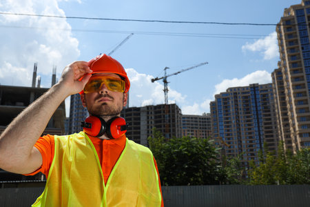 Young man civil engineer in safety hatの写真素材