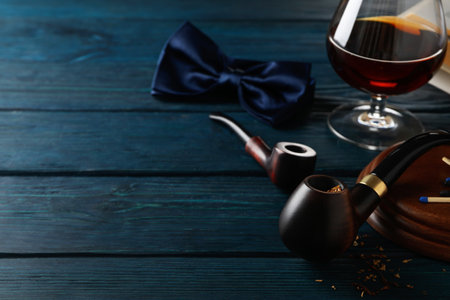 Concept of relaxing, smoking pipe, space for textの写真素材